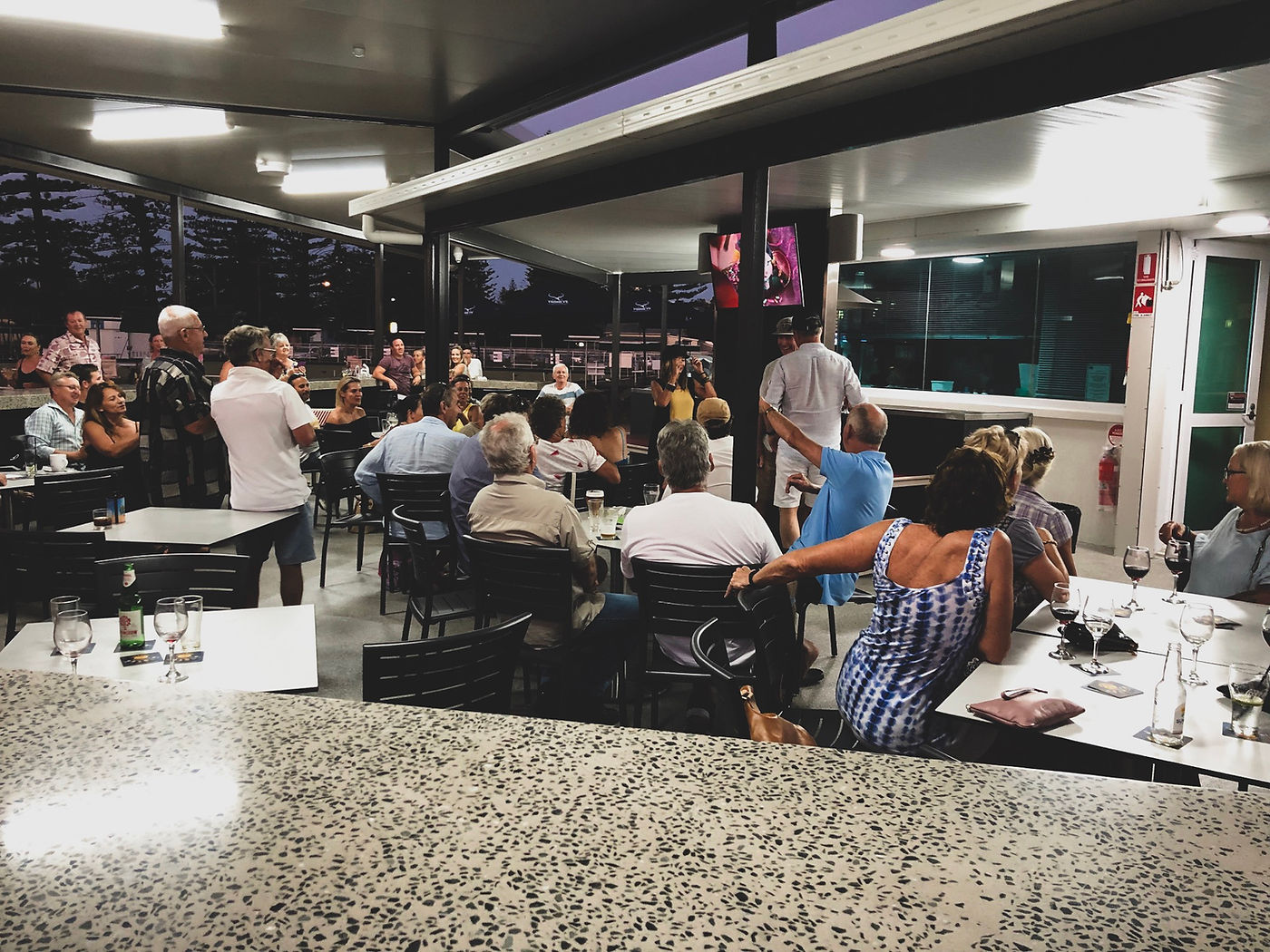 Guests celebrating on the outdoor deck at Yamba Bowling Club